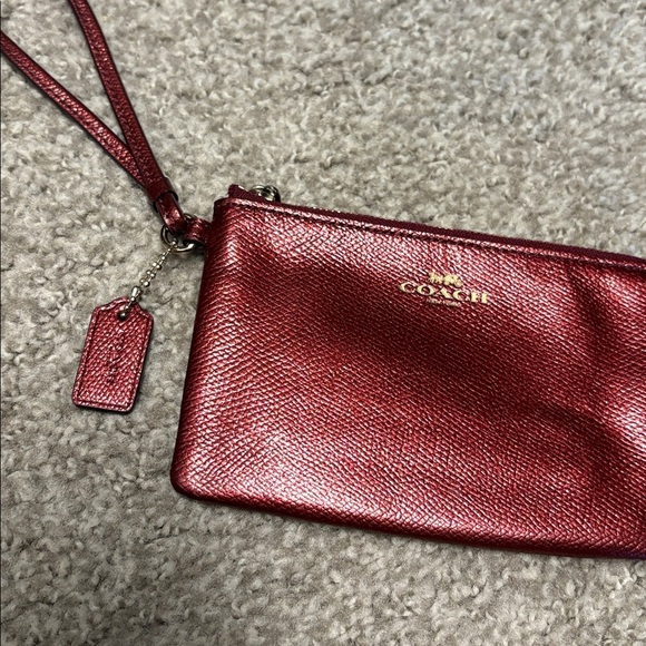 Red metallic Coach wristlet with zipper closure + bag tag attached - Picture 6 of 9